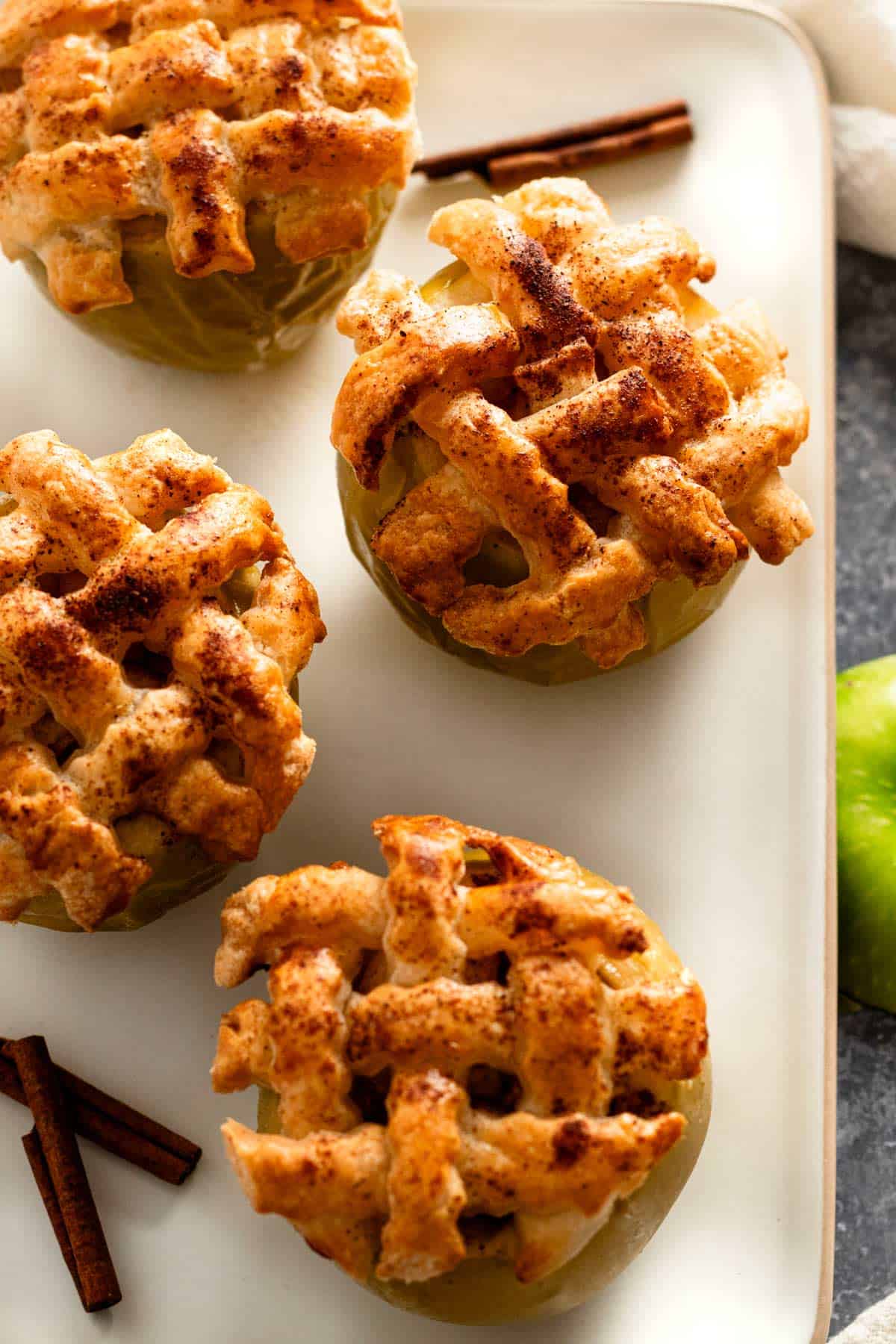 air fryer baked apples with cinnamon dough topping.