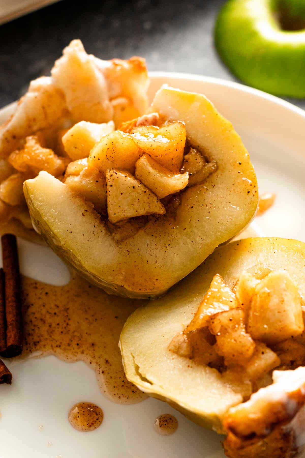 green baked apple cut in half.