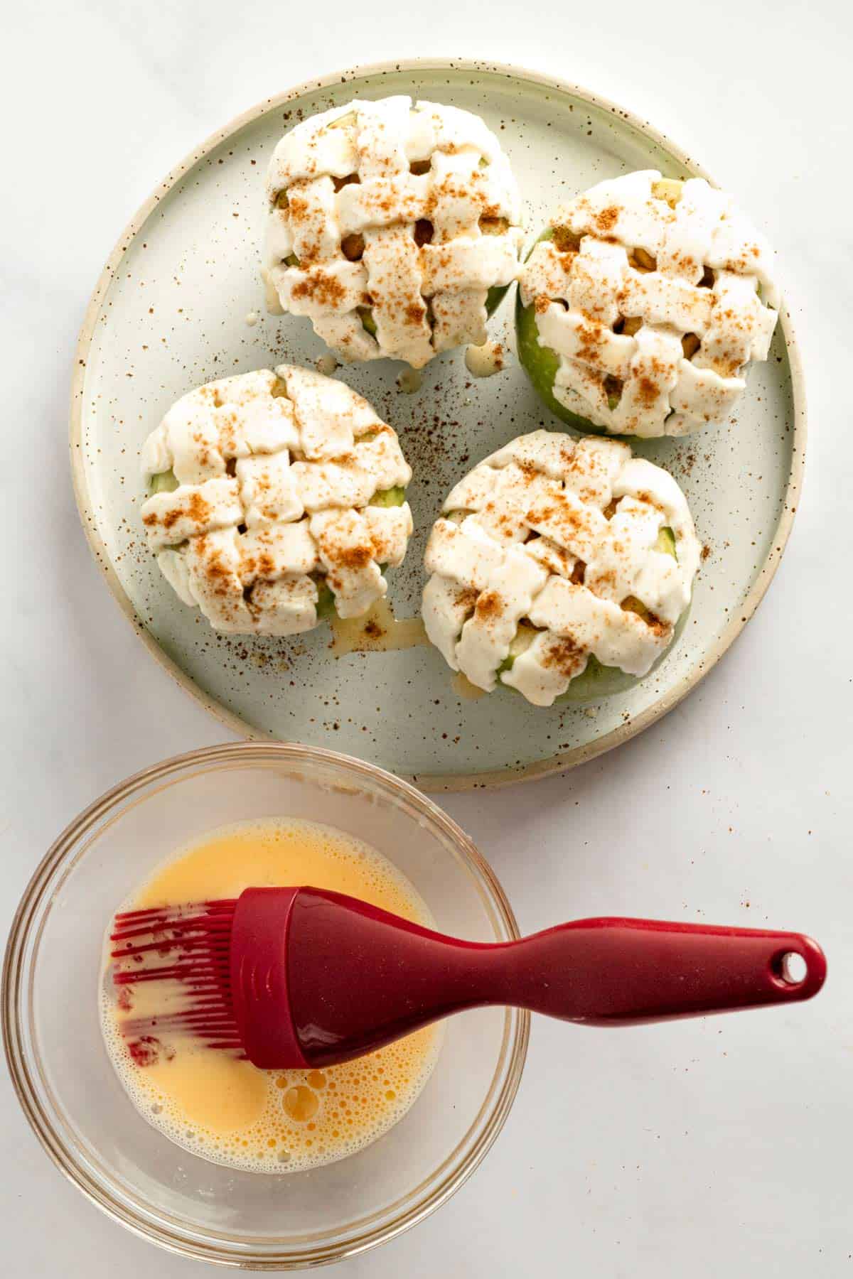 stuffed apples with puff pastry topping brushed with egg and milk mixture.