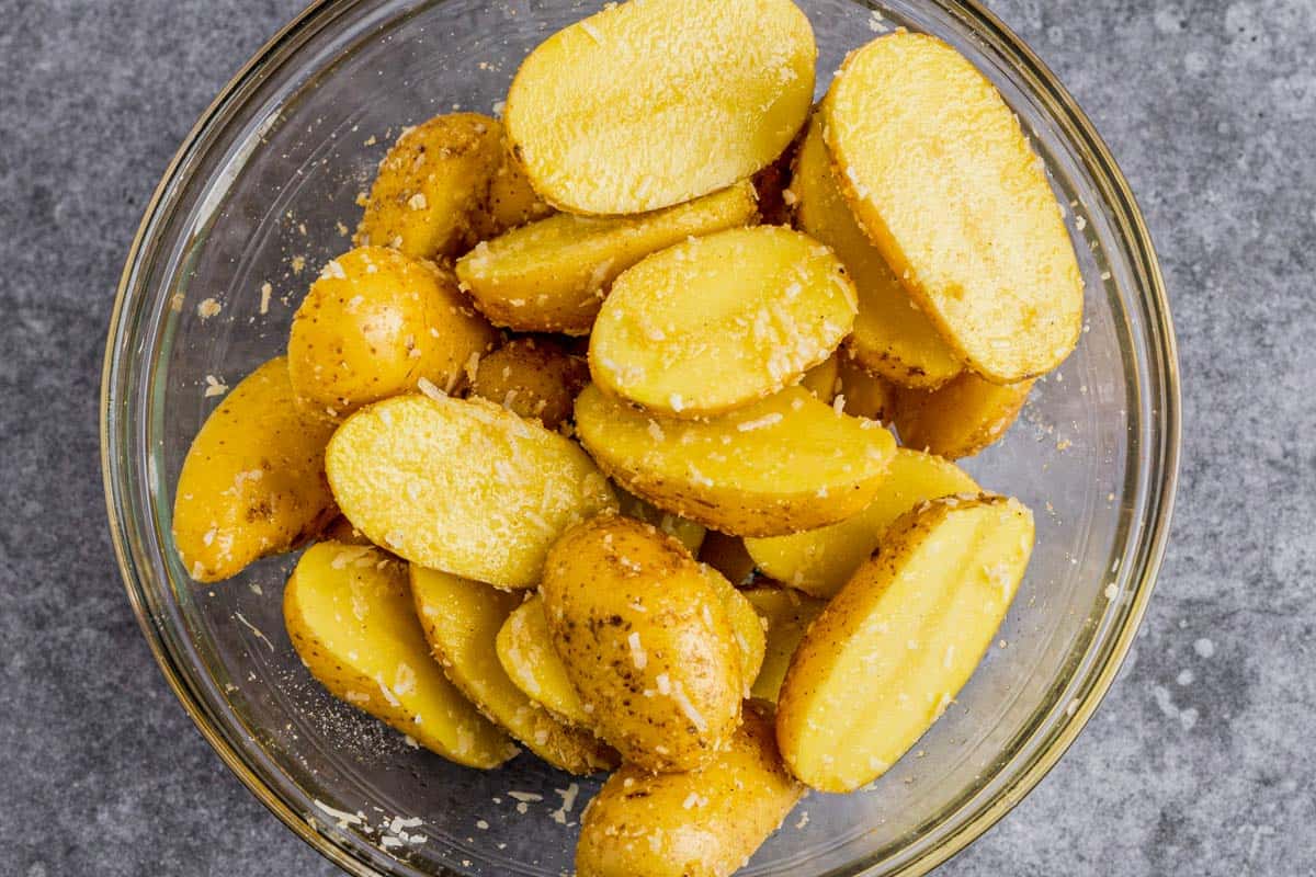 potatoes with seasonings in a bowl