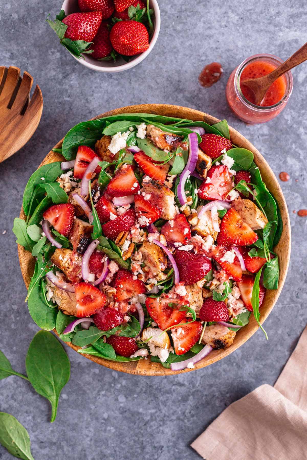 Chicken Salad With Strawberries ina wooden bowl