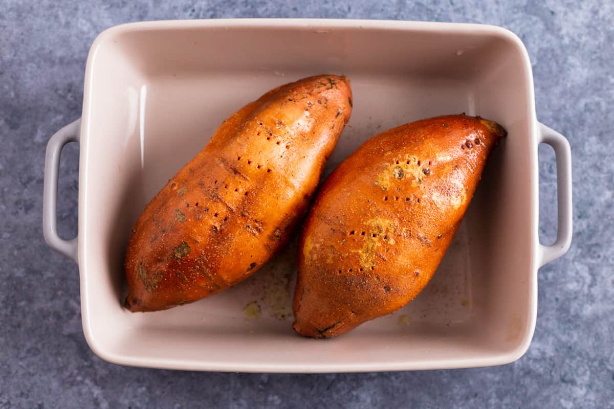 sweet potatoes in a baking dish before baking