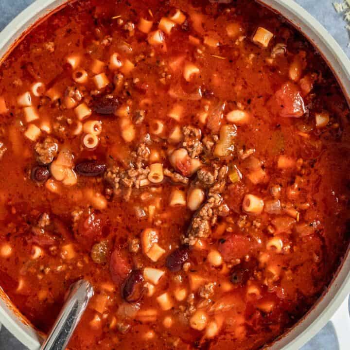 red soup with tomato sauce, beef and vegetables.