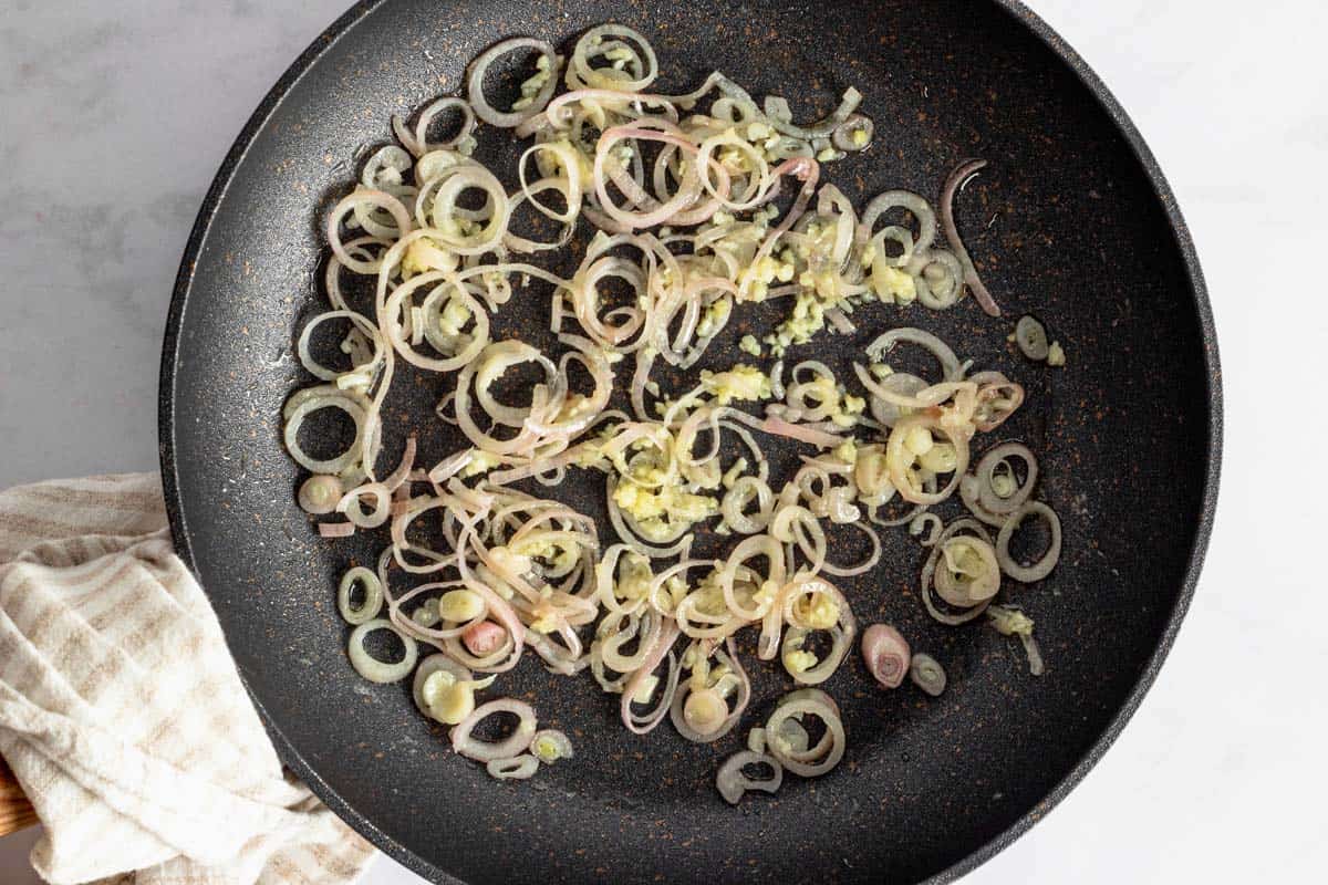 sauteing shallots in skillet.