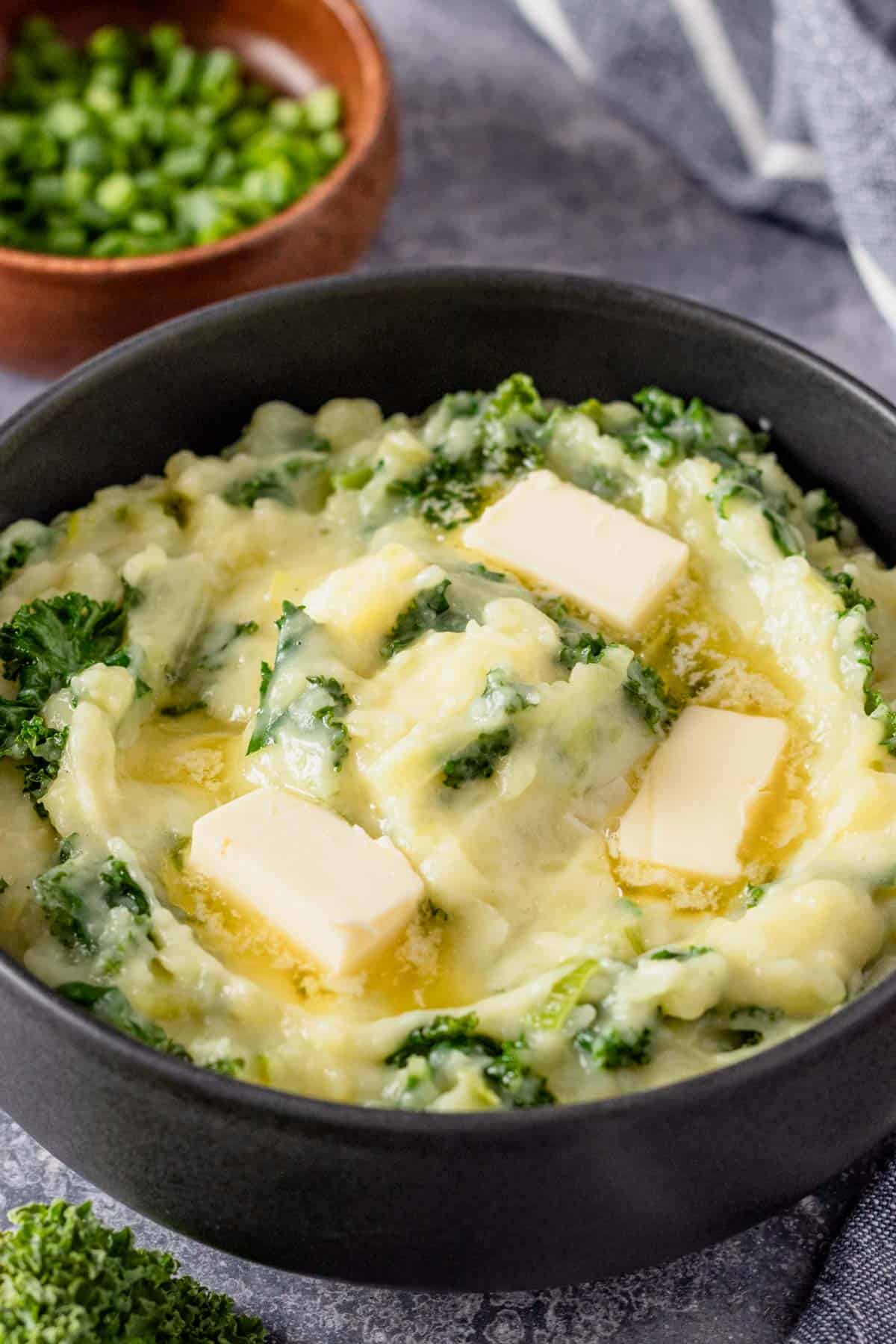 mashed potatoes with kale in a bowl