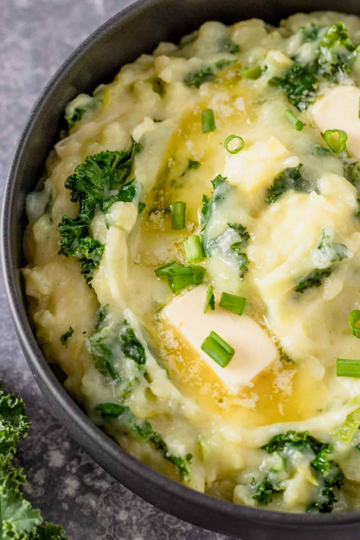 mashed potatoes with kale in a bowl