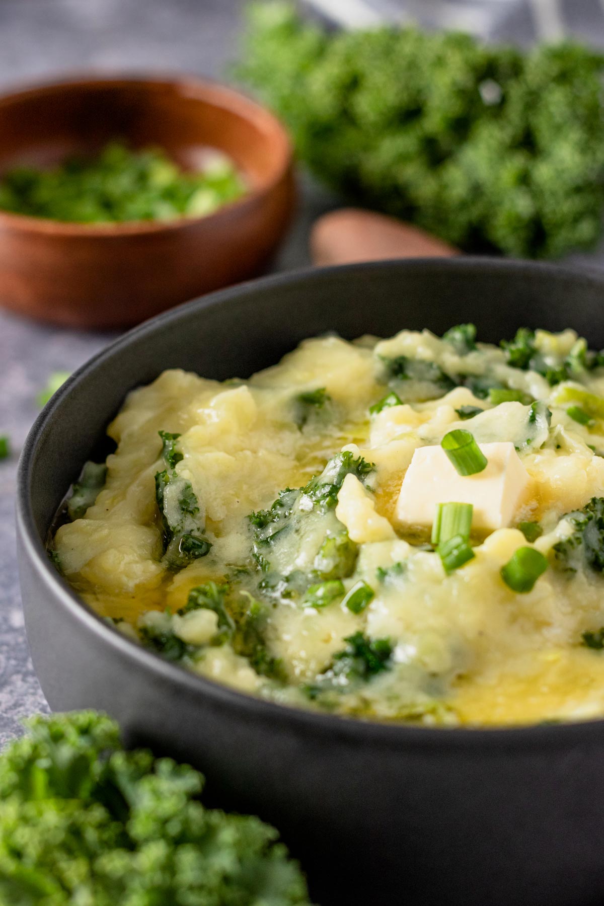 mashed potatoes with kale in a bowl