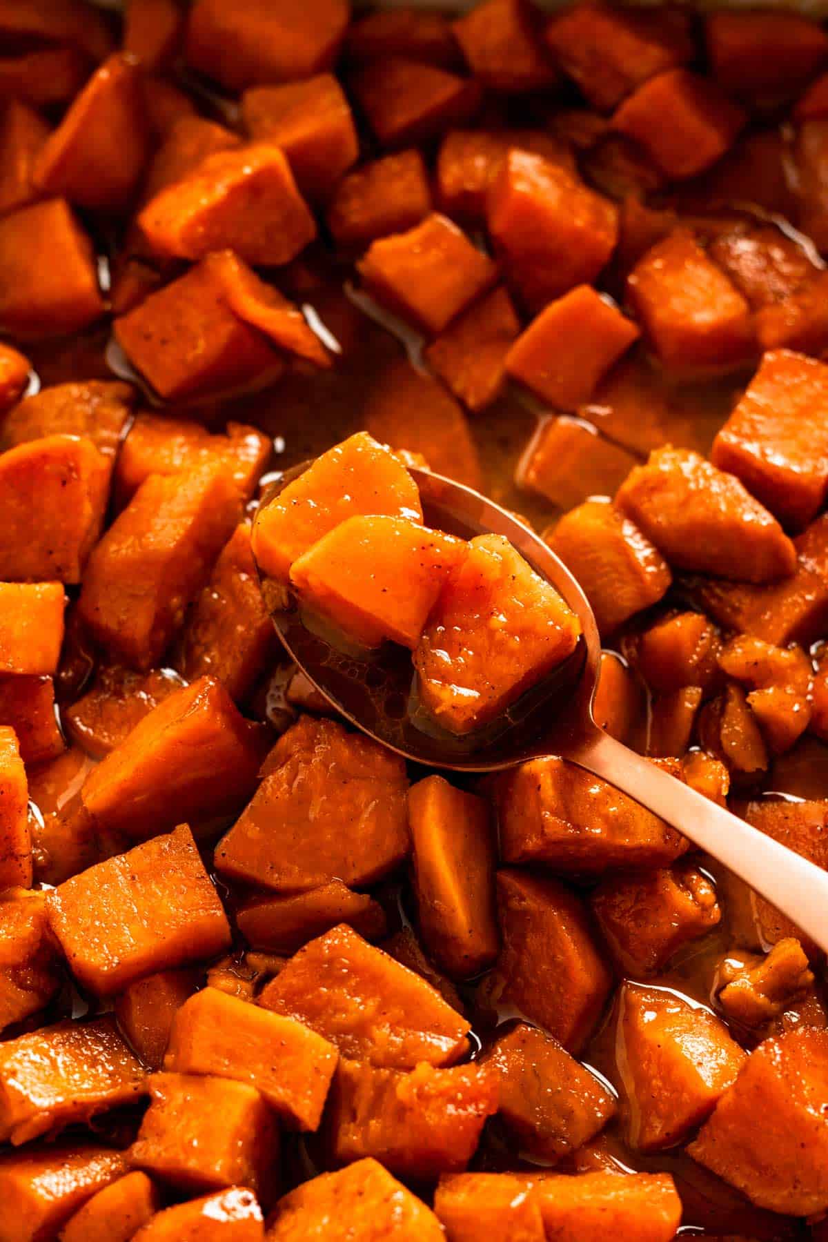 baked candied sweet potatoes in casserole.