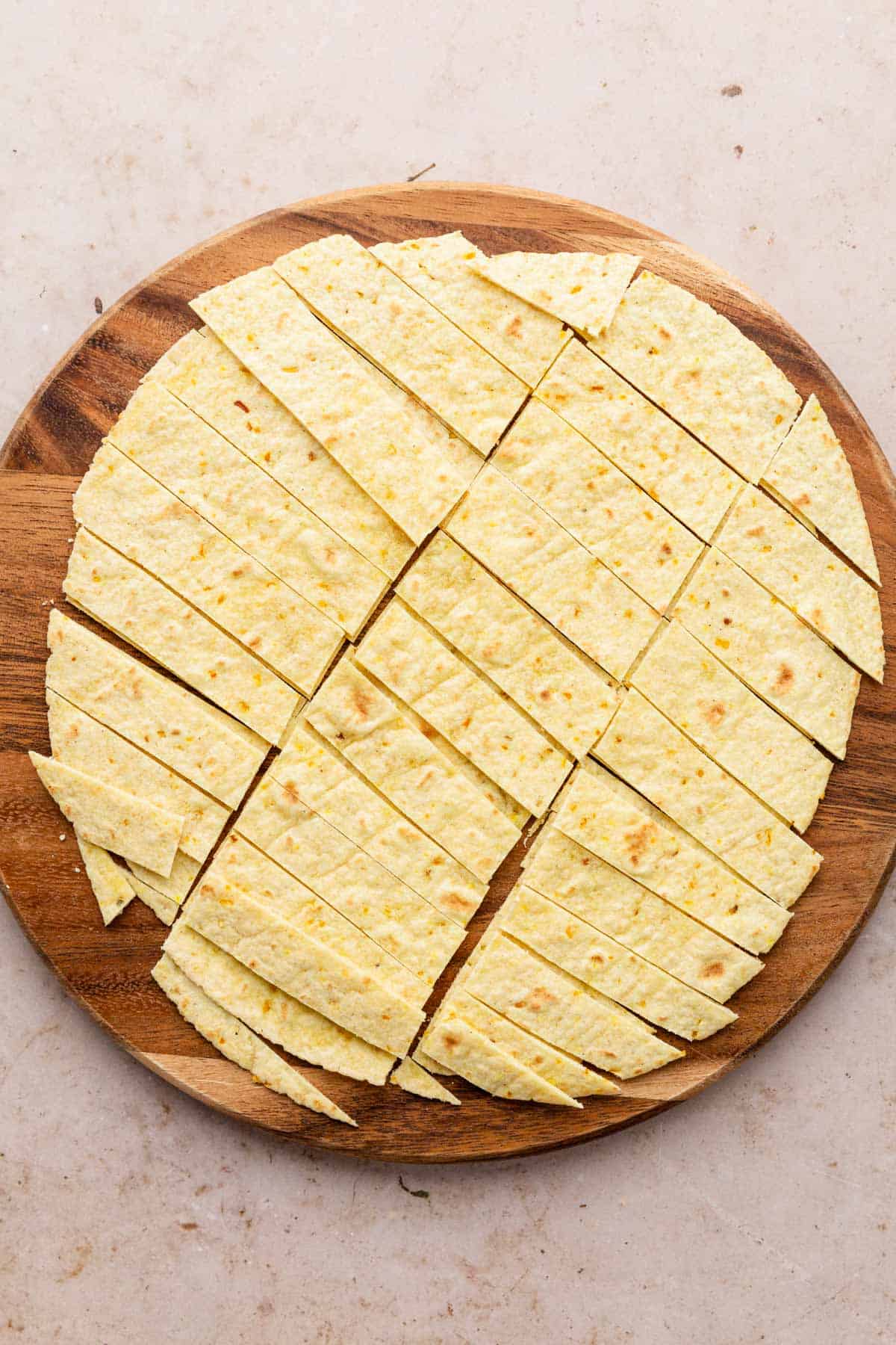 corn tortillas cut into strips and ready for frying.