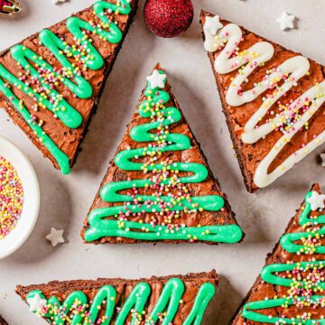 christmas tree brownies with green powdered sugar glaze and sprinkles