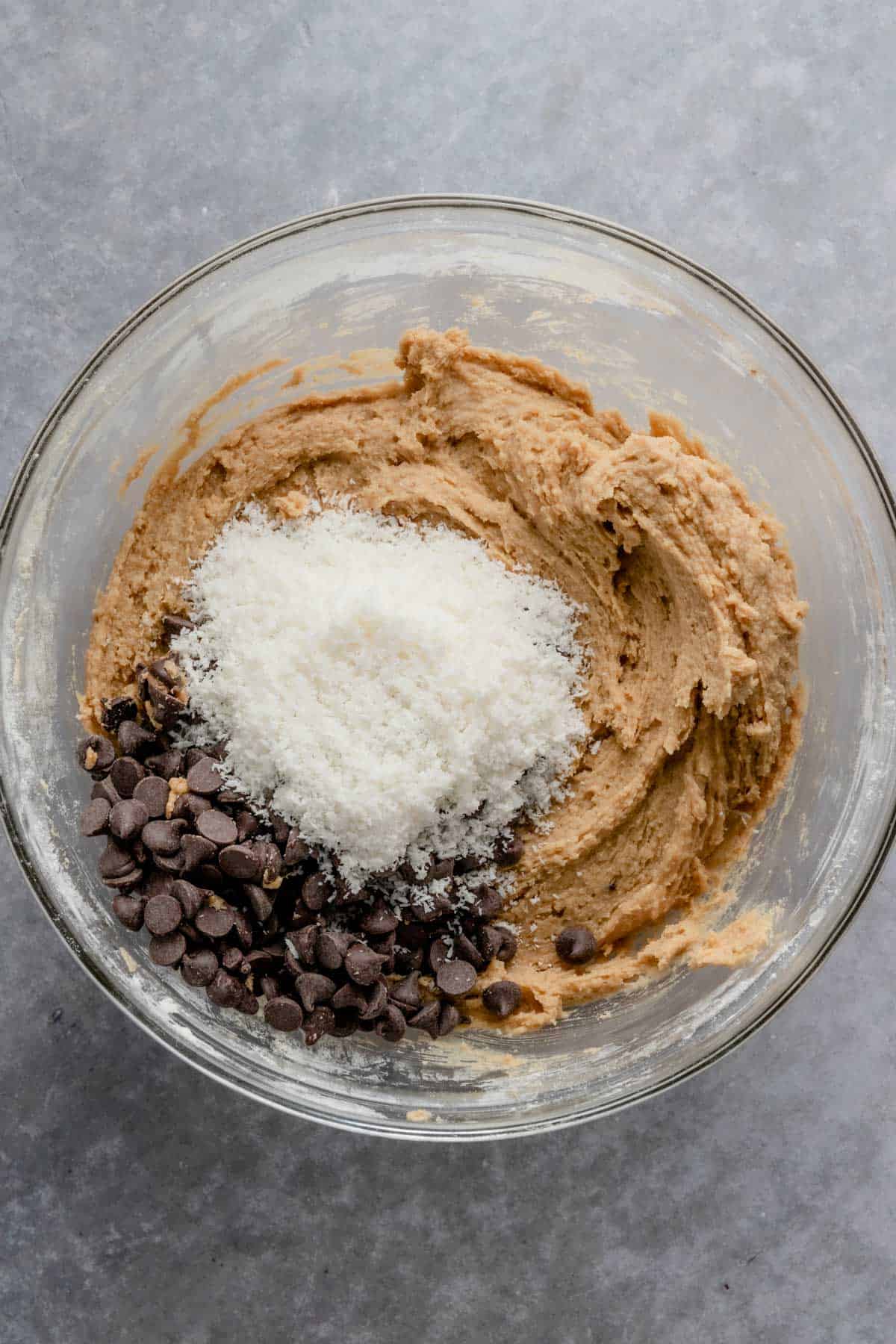 coconut chocolate chip cookie dough with desiccated coconut and chocolate chips