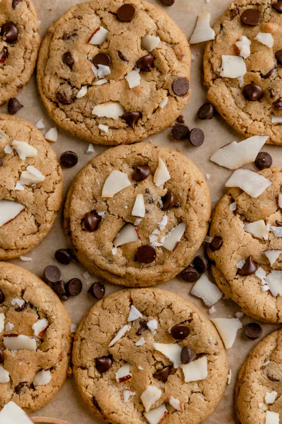 coconut chocolate chip cookies on brown baking paper