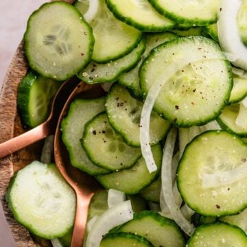 A bowl of Cucumbers and Onions In Vinegar