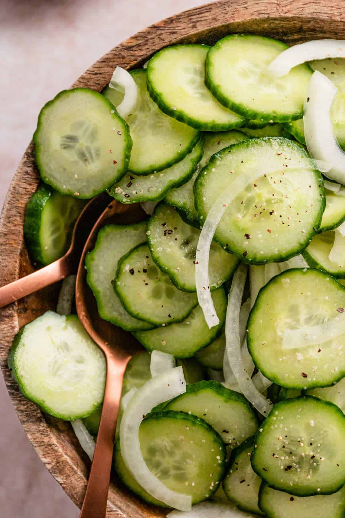 A bowl of Cucumbers and Onions In Vinegar