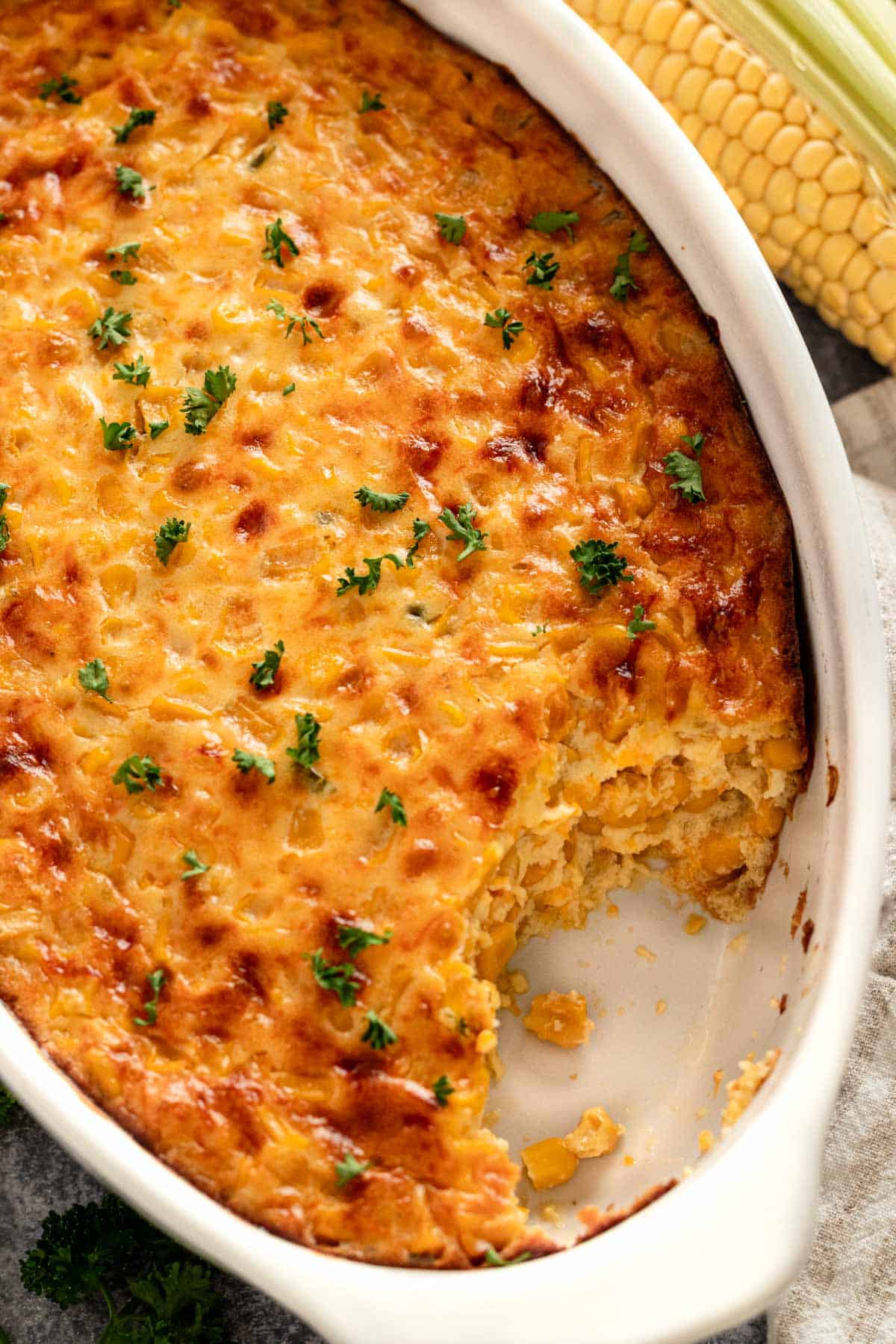 corn casserole in oval baking dish.