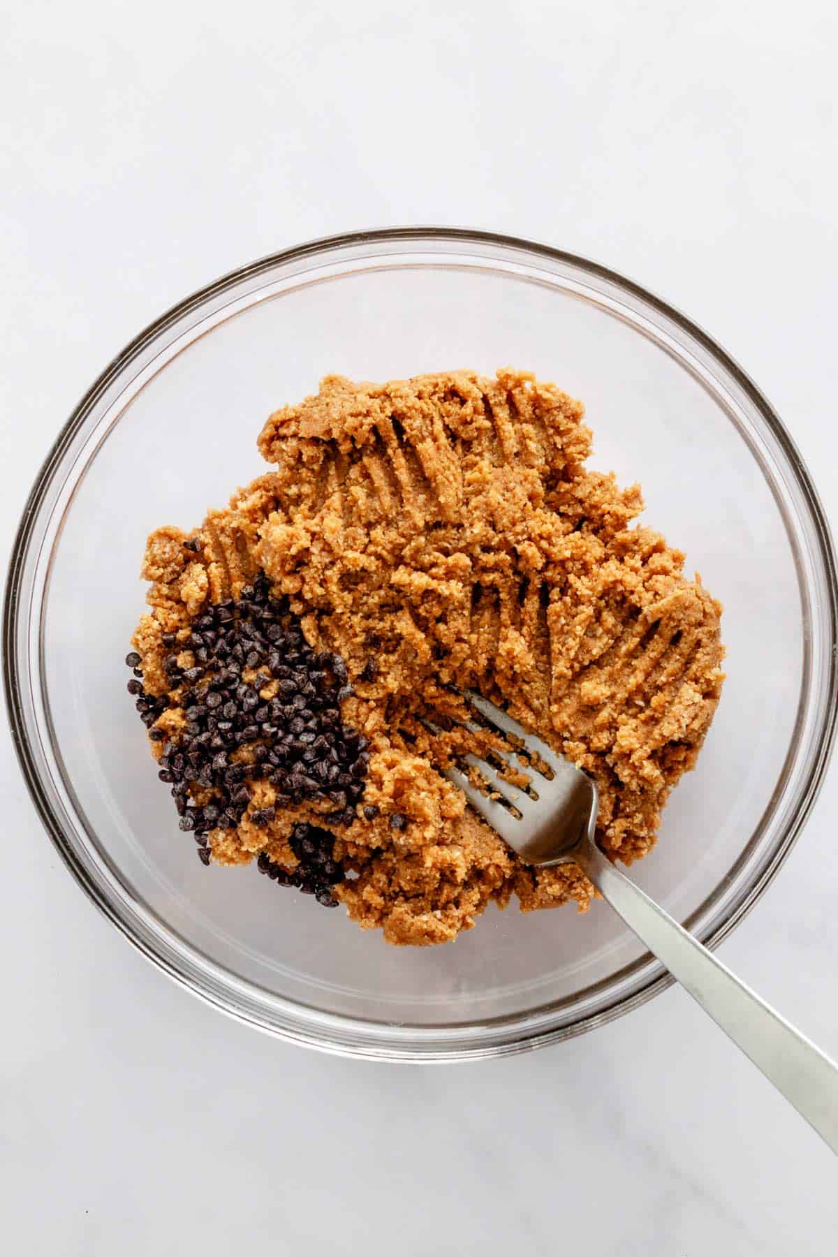 peanut butter mixed together with almond flour and chocolate chips.