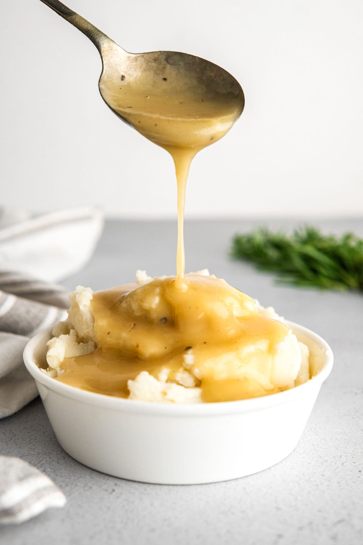 mashed potatoes drizzled with gravy.