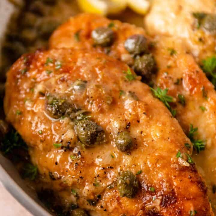 lemon caper chicken piccata in a skillet