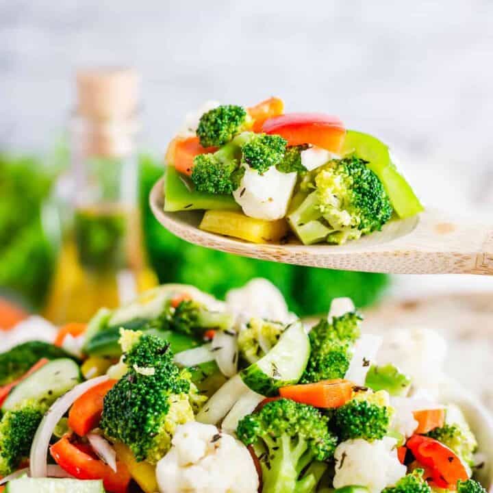 close up shot of a marinated broccoli and cauliflower salad