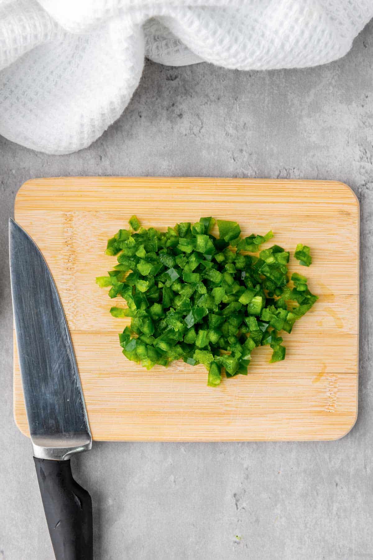 cutting green bell pepper