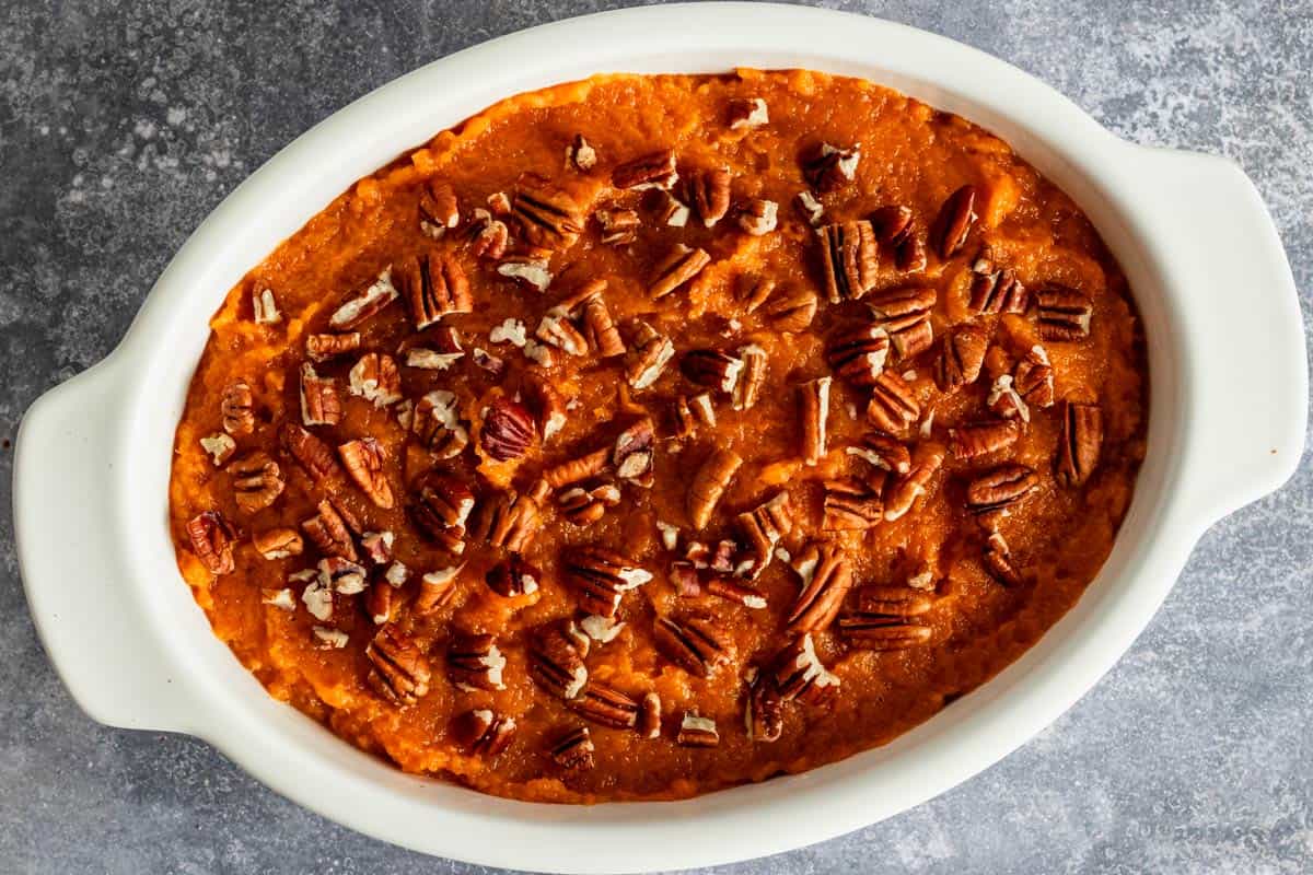 pecan topping on top of mashed sweet potatoes.