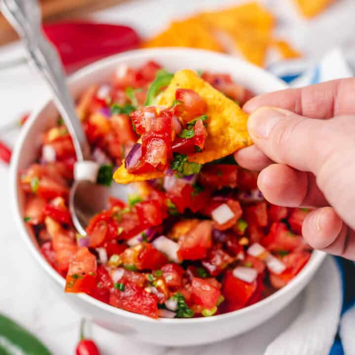 pico de gallo (mexican tomato salsa) in a bowl with tortilla chips