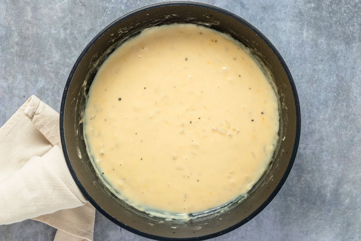 creamy sauce in a pot cooking
