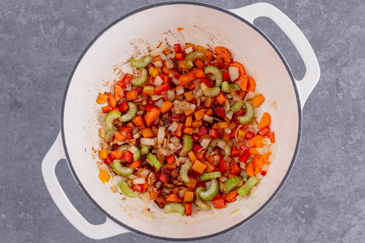 vegetables cooking in dutch oven for pumpkin chili