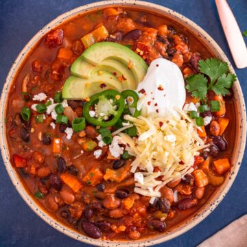 Vegan Pumpkin Chili with sour cream cheese jalapeno toppings