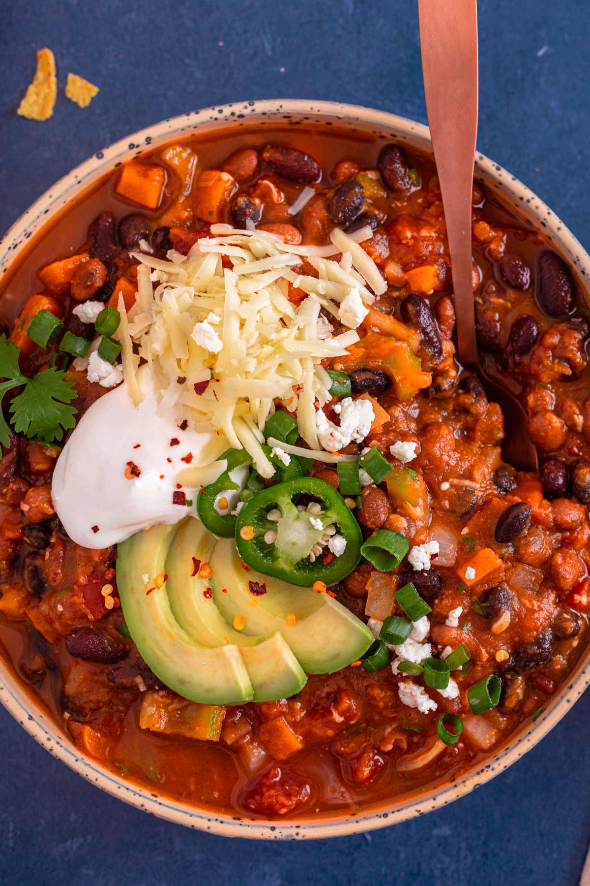 Vegan Pumpkin Chili with sour cream cheese jalapeno toppings