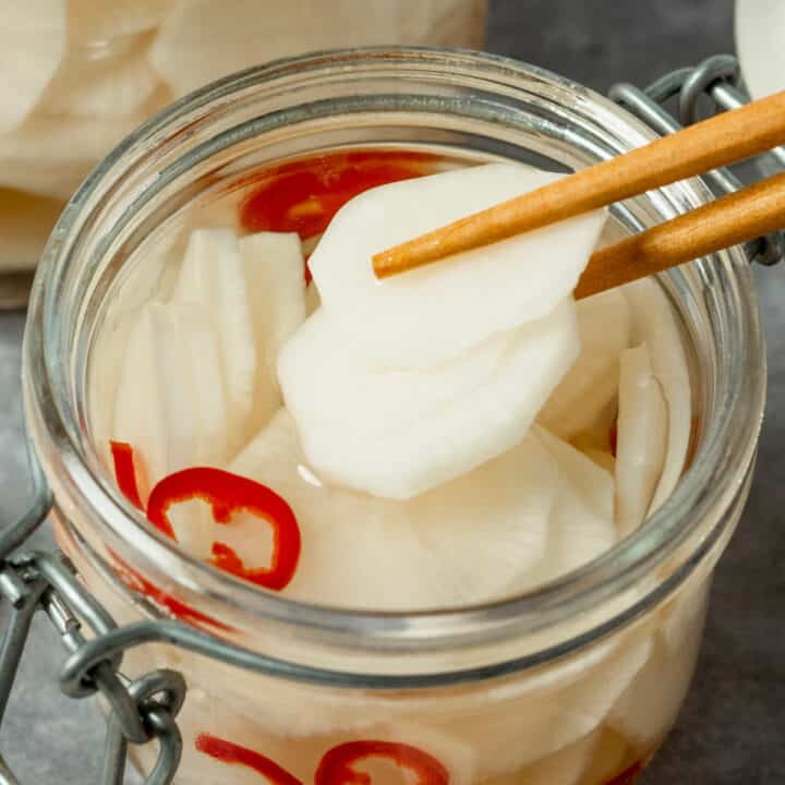 pickled daikon radish in a mason jar.