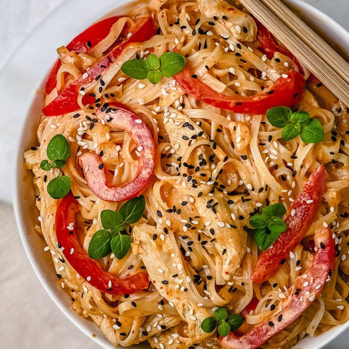 These Thai Red Curry Chicken Noodles are the perfect easy dinner recipe that will be ready in 15 minutes! This bowl of noodles is huge on flavor and is packed with bites of tender chicken, coconut milk, rice noodles, spices, and lime juice. Comforting, filling, and gluten free!