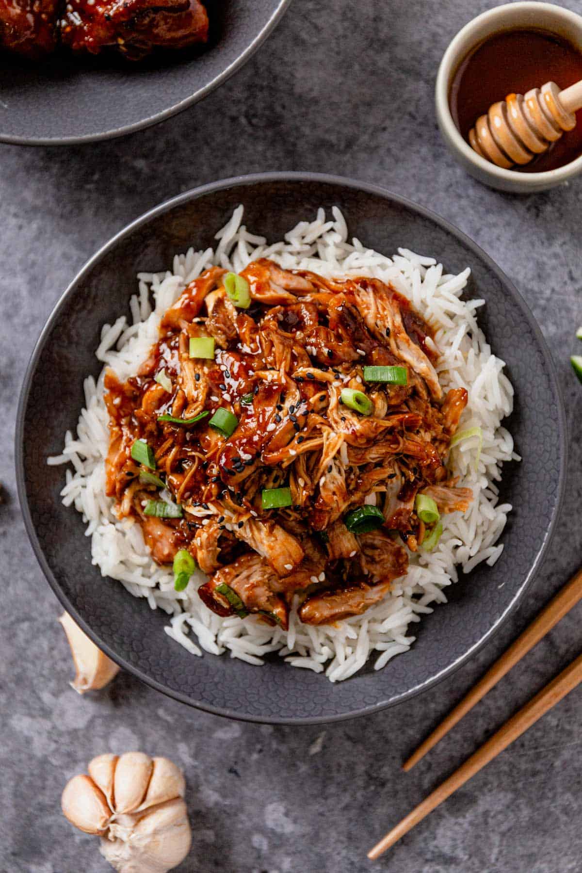 shredded slow cooker honey garlic chicken thighs