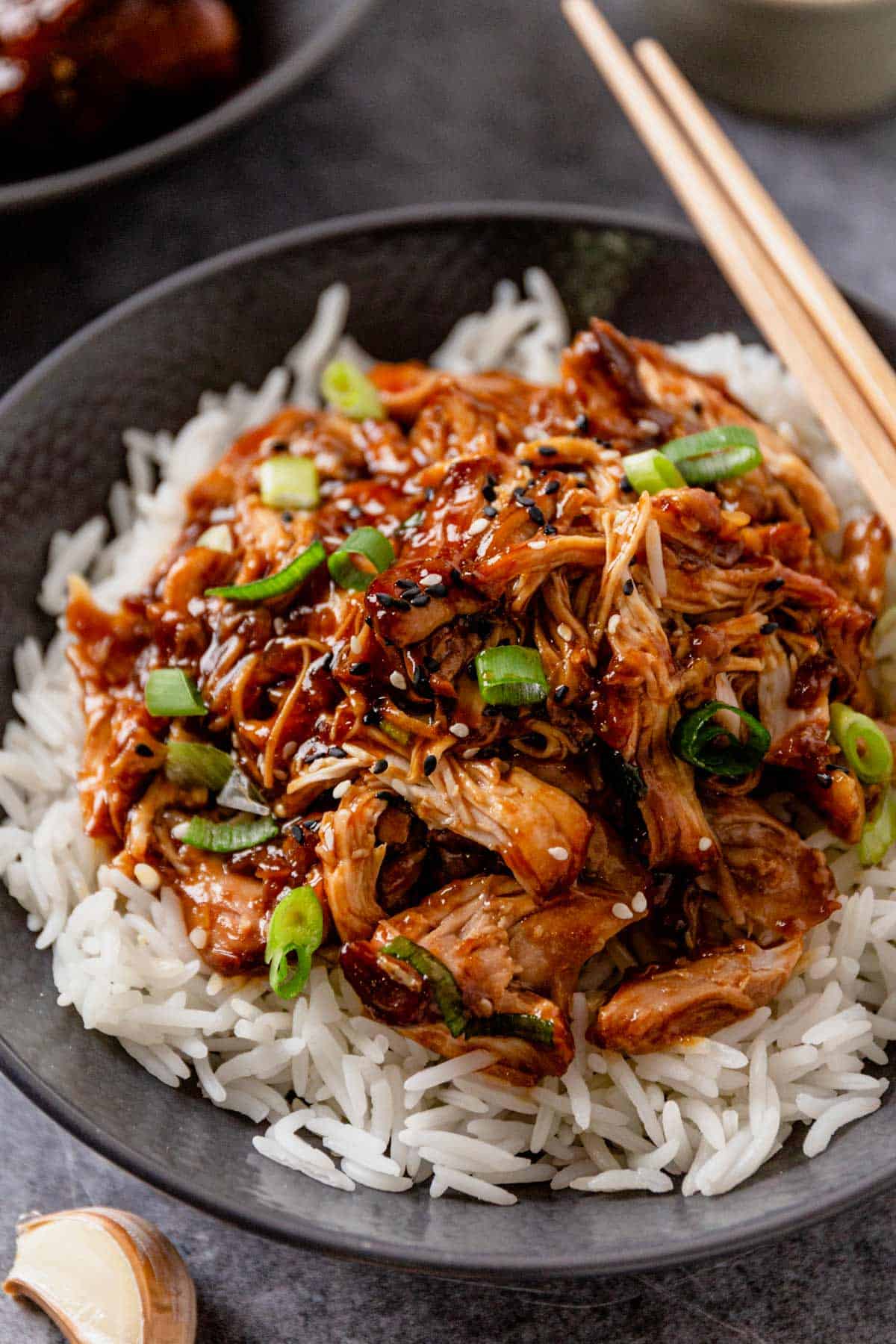 shredded slow cooker honey garlic chicken thighs