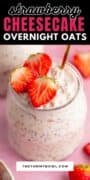creamy oats and strawberries in a glass jar.