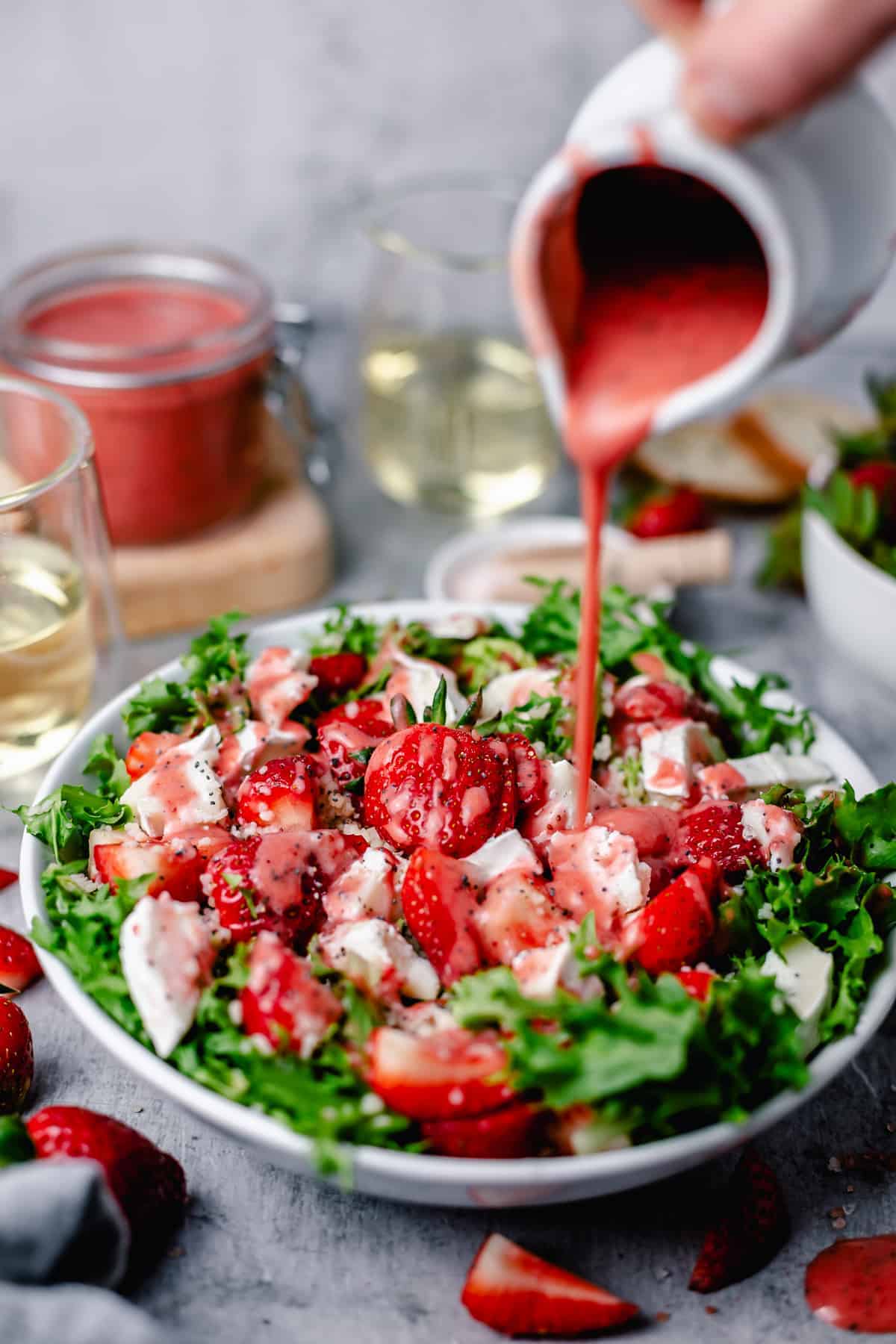 bright strawberry salad in a white bowl