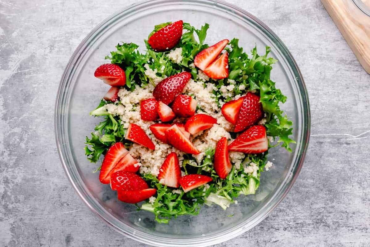 bright strawberry salad in a white bowl