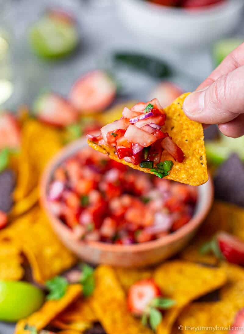 strawberry salsa dip on a tortilla chips close up