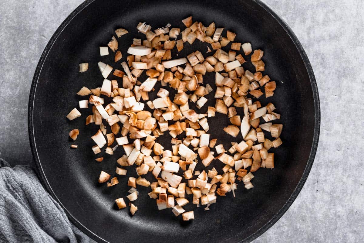 sauteeing mushroom stems in skillet