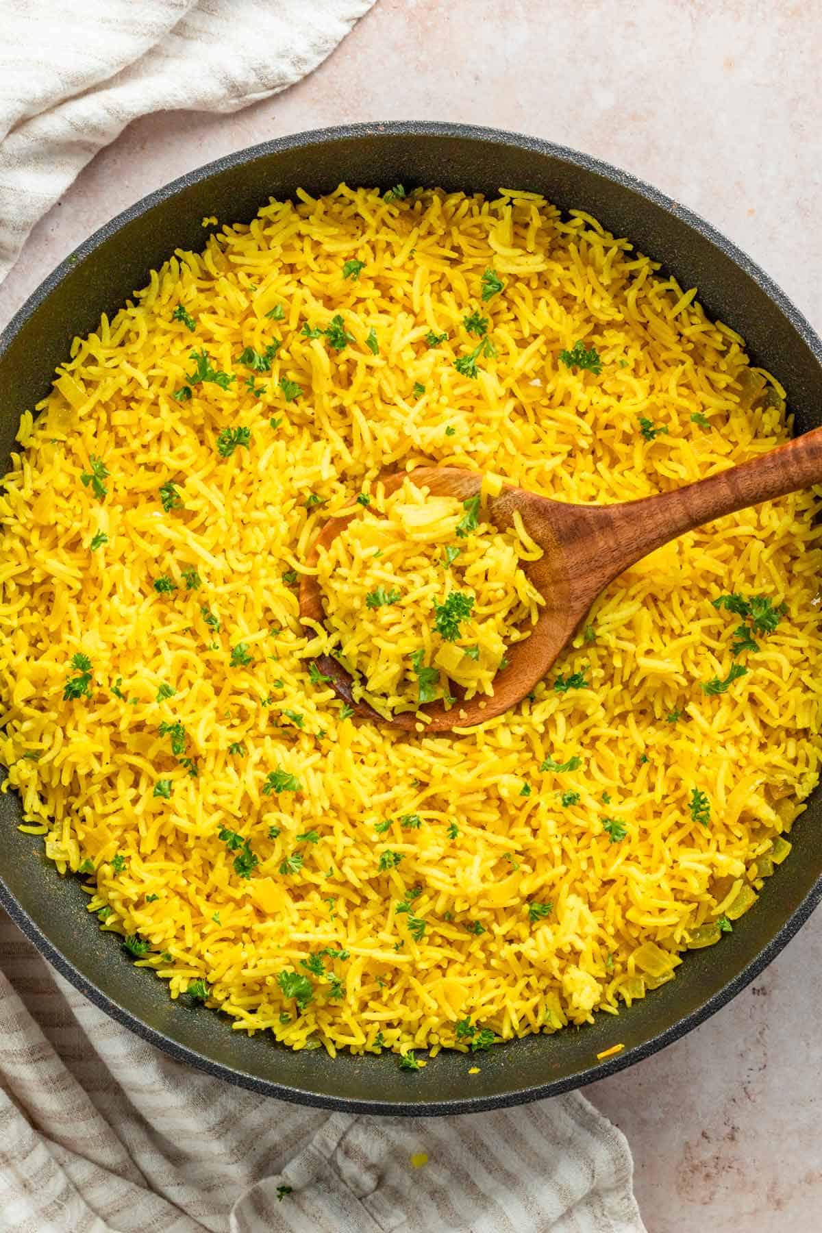 a skillet of yellow rice.